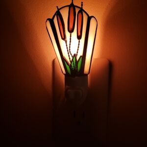 Artistic Stained Glass Night Light with Green and Orange Highlights